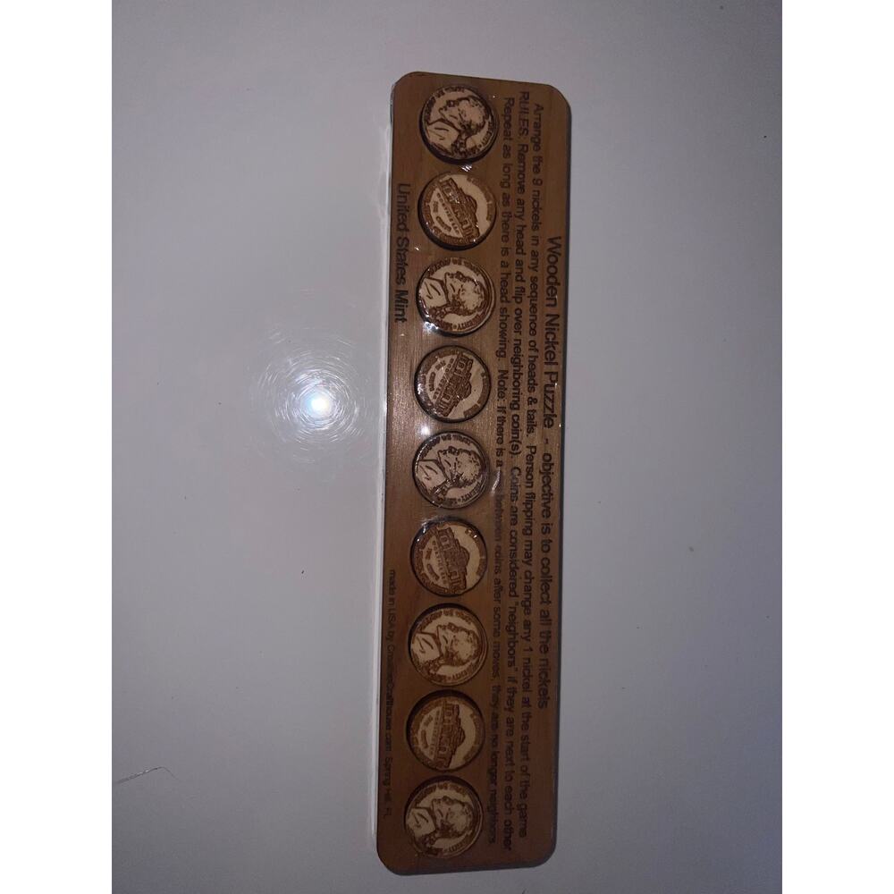 wooden nickel puzzle objective is to collect all the nickels